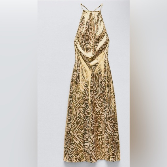 Zara Dresses & Skirts - NWT Zara Gold Zebra Print Maxi Dress
Small Cross Back Detail